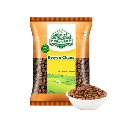 PureCrop-Brown-Chana Dark brown Pure Crop Brown Chana (Kala Chana) scattered on a wooden surface.